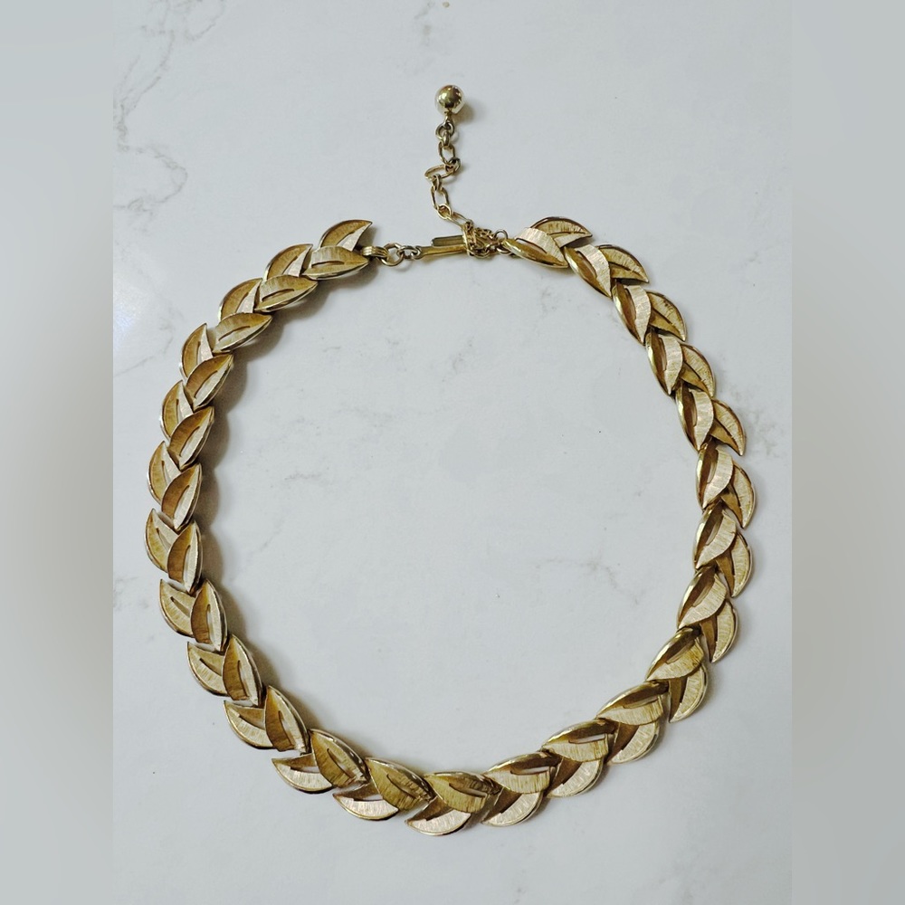 Trifari gold tone necklace and matching earrings